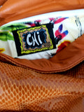 The "Crown Royal" Apricot Snake Print Hobo Handbag